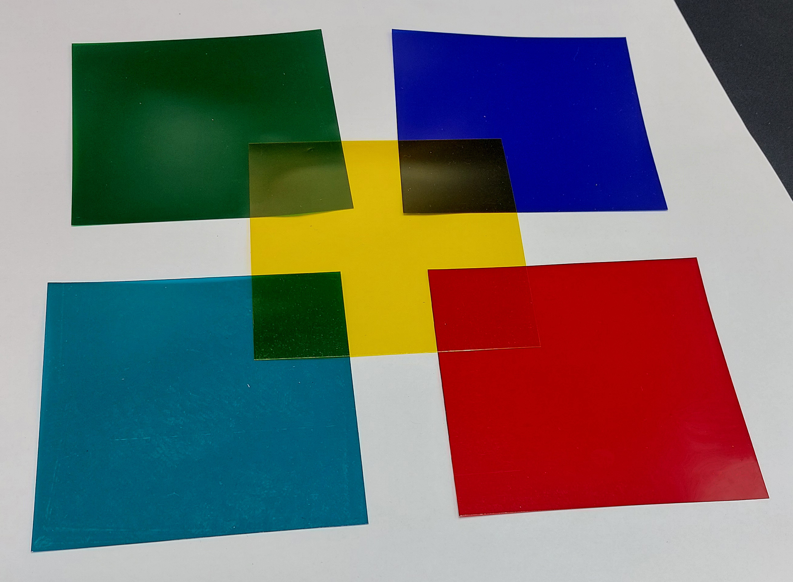 Put various colored transparent papers on top of each other.